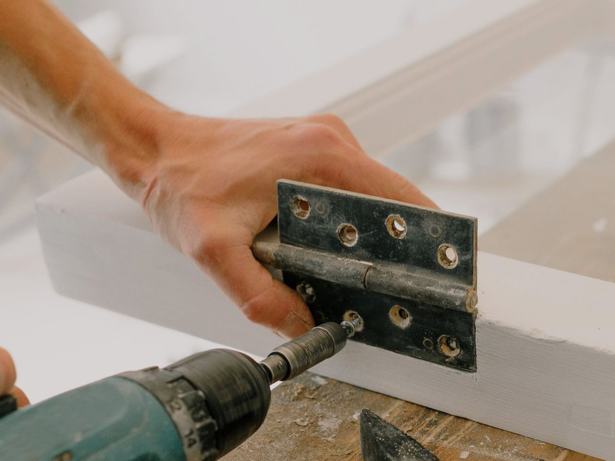 Fitting new hinges — BuildMan Doors & Carpentry Toronto