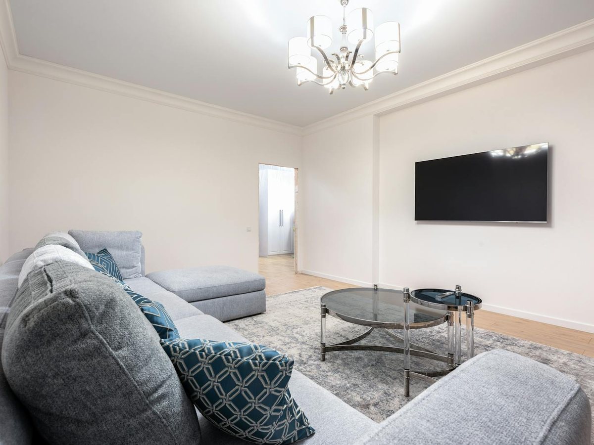 Mounted TV in a modern living room — BuildMan TV & Wall Mounting Toronto